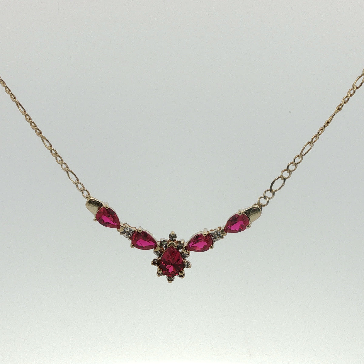 Pear Cut Ruby Drop Necklace in Yellow Gold