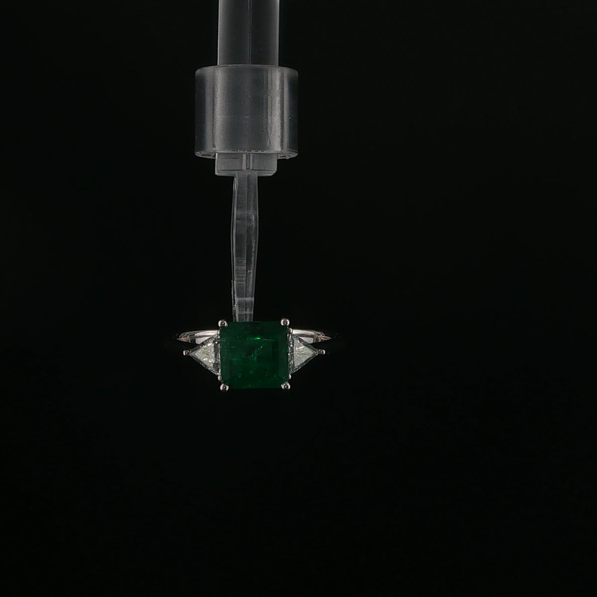 Emerald and Trillion Diamond Three-Stone Ring in White Gold