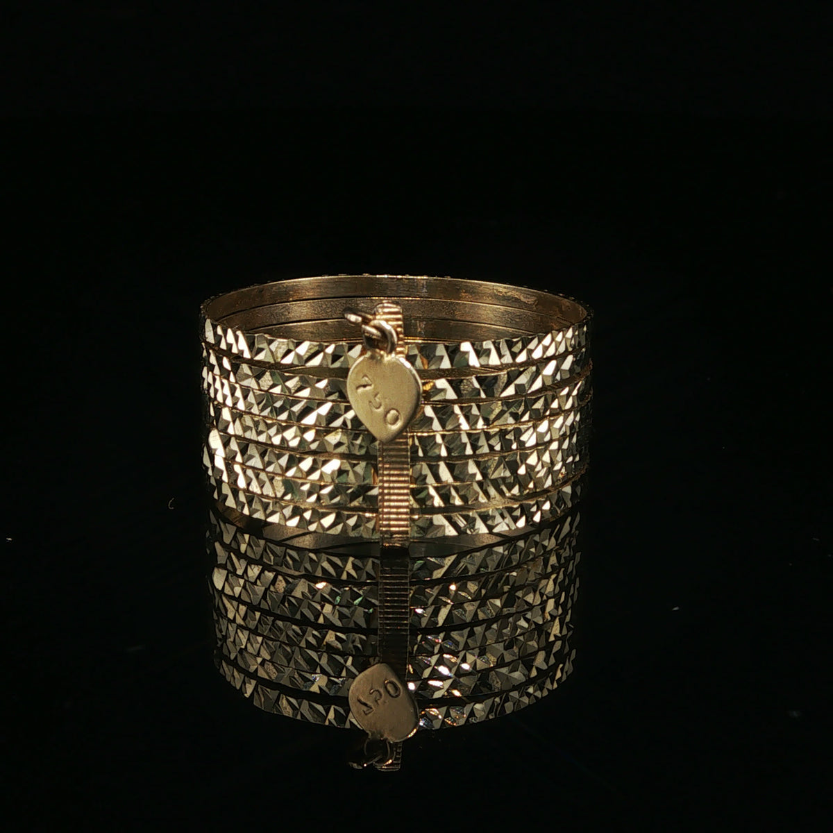 Diamond-Cut Yellow Gold Stacked Bangles