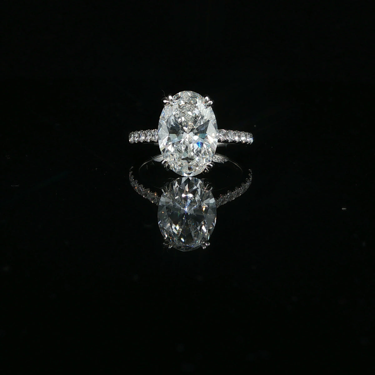 Oval Cut Diamond Solitaire Ring — White Gold