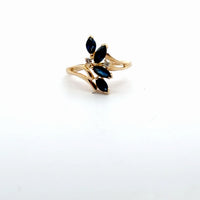 Yellow Gold Ring with Deep Blue Marquise Cut Sapphires