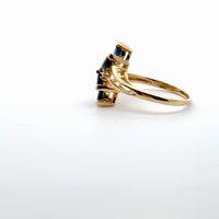 Yellow Gold Ring with Deep Blue Marquise Cut Sapphires