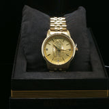 Yellow Gold Bulova Watch with Virgin Mary Sunburst Dial