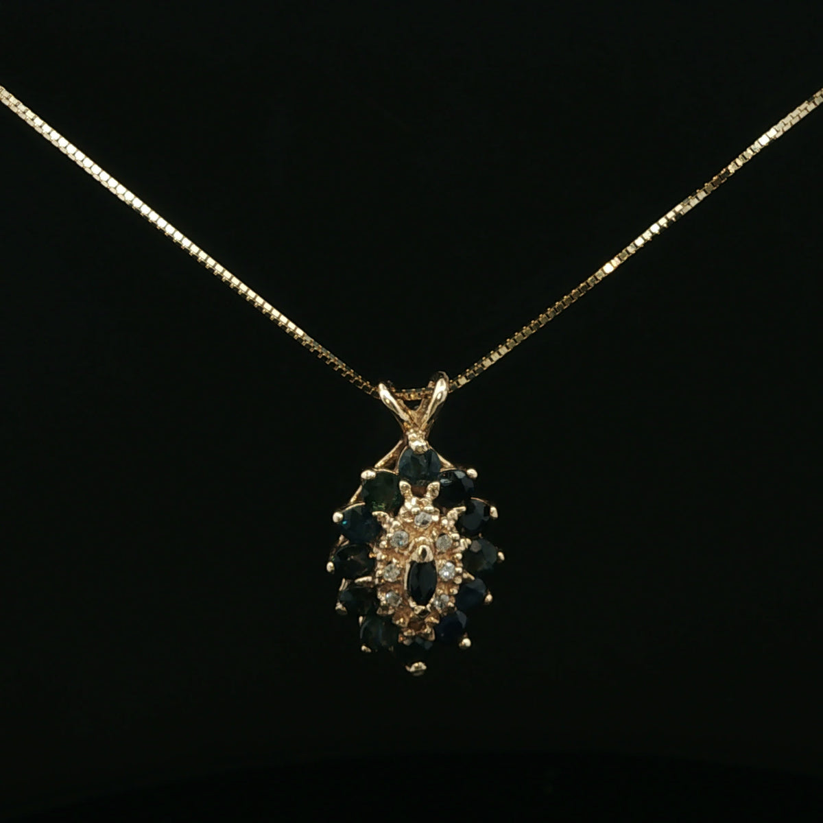 Deep Blue Sapphire Cluster Pendant on Yellow Gold Chain