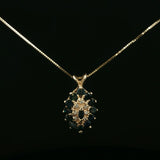 Deep Blue Sapphire Cluster Pendant on Yellow Gold Chain