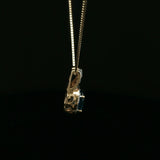Oval Blue Topaz Halo Pendant Necklace in Yellow Gold