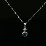 White Gold Blue Topaz Rope Bezel Pendant Necklace