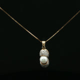 Whimsical Peanut Shell Pearl Pendant in Yellow Gold