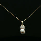 Whimsical Peanut Shell Pearl Pendant in Yellow Gold