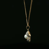 Whimsical Peanut Shell Pearl Pendant in Yellow Gold