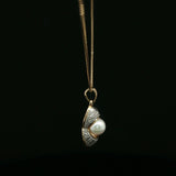 Whimsical Peanut Shell Pearl Pendant in Yellow Gold