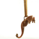 Vivid Orange Sapphire Dragon Pendant Necklace in Yellow Gold