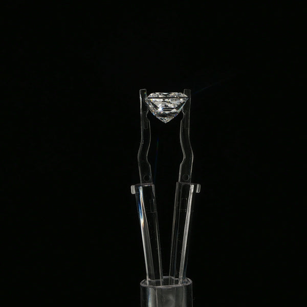 Loose Diamond in Tweezers