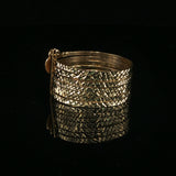 Diamond-Cut Yellow Gold Stacked Bangles