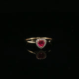 Heart-Shaped Red Ruby Halo Ring in Yellow Gold