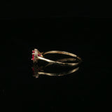 Heart-Shaped Red Ruby Halo Ring in Yellow Gold