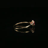 Heart-Shaped Red Ruby Halo Ring in Yellow Gold