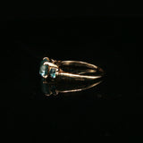 Blue Topaz Three-Stone Ring in Yellow Gold