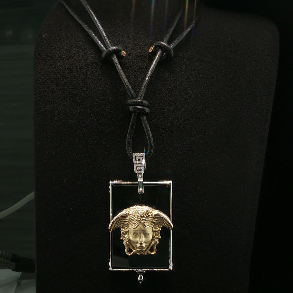 White Gold and Onyx Medusa Charm Necklace