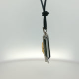 White Gold Onyx Charm Necklace with Sculpted Face Motif