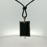 White Gold Onyx Charm Necklace with Sculpted Face Motif