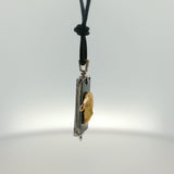 White Gold Onyx Charm Necklace with Sculpted Face Motif
