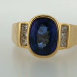 Bezel-Set Royal Blue Sapphire Ring in Yellow Gold
