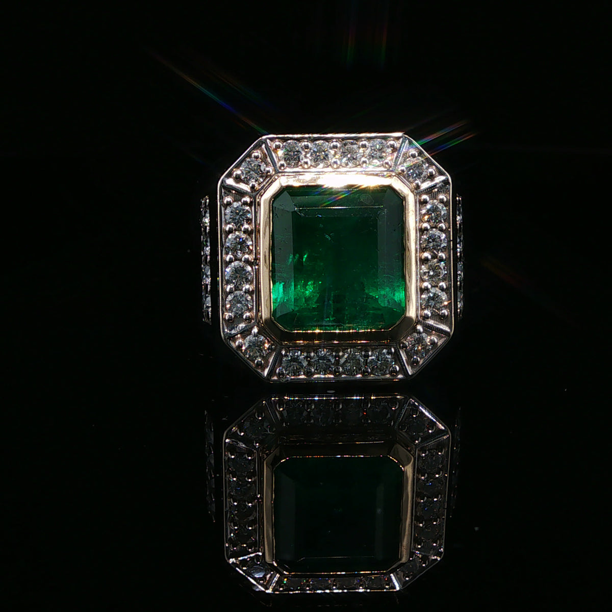 Emerald Cut Emerald and White Gold Halo Cocktail Ring