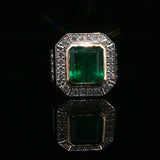 Emerald Cut Emerald and White Gold Halo Cocktail Ring
