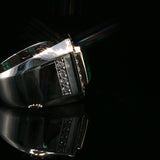 Emerald Cut Emerald and White Gold Halo Cocktail Ring