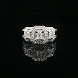 Triple Emerald-Cut Diamond Halo Ring in White Gold