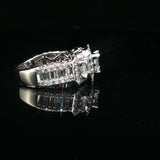 Triple Emerald-Cut Diamond Halo Ring in White Gold