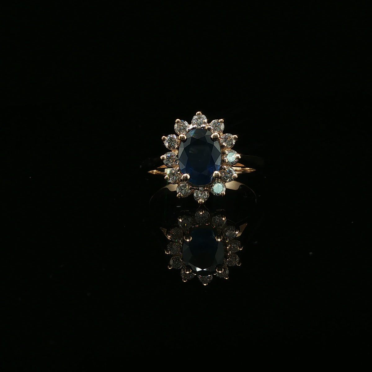 Royal Blue Sapphire and Diamond Halo Cocktail Ring in Yellow Gold