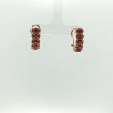 Oval Ruby Drop Earrings in Yellow Gold