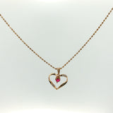 Open Heart Ruby Charm Necklace in Yellow Gold
