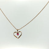 Open Heart Ruby Charm Necklace in Yellow Gold