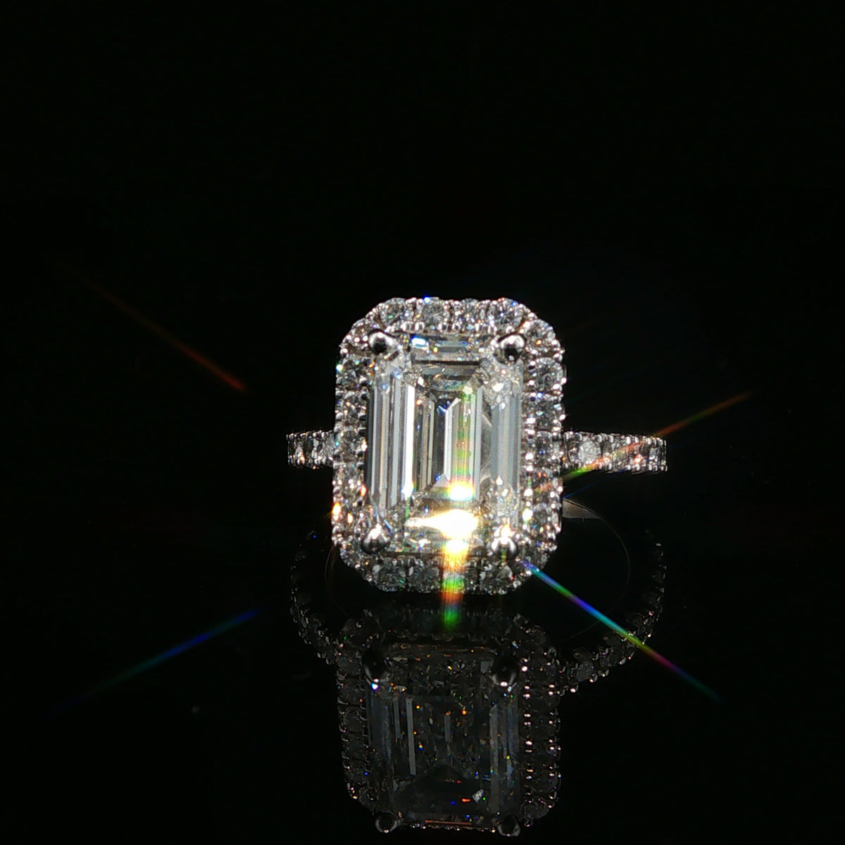 Emerald Cut Diamond Halo Engagement Ring in White Gold