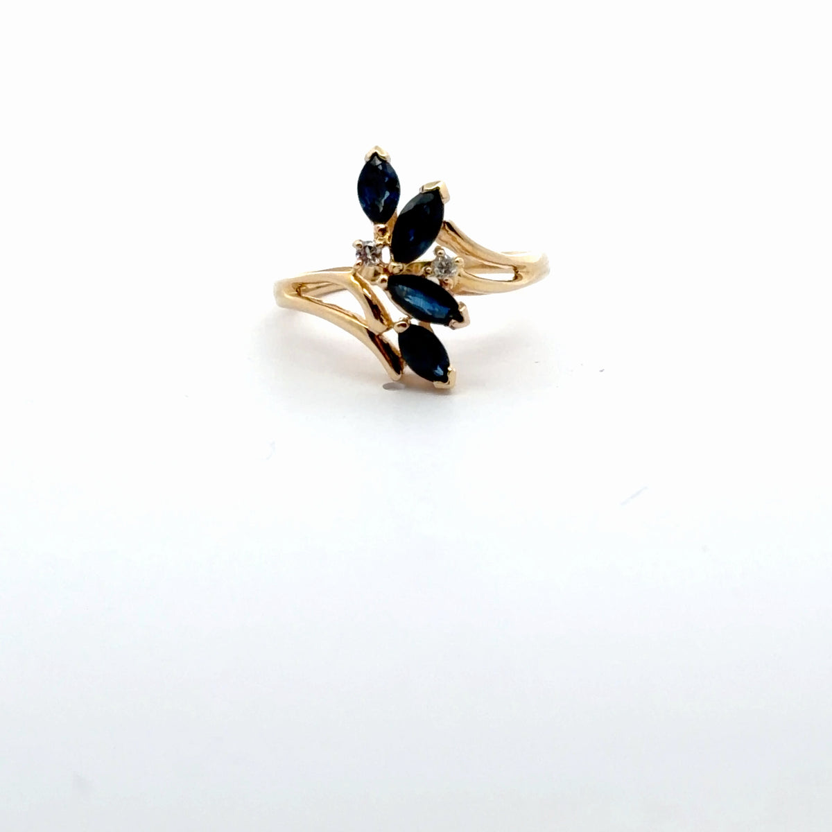Yellow Gold Ring with Deep Blue Marquise Cut Sapphires