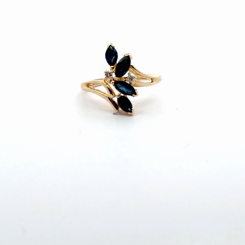 Yellow Gold Ring with Deep Blue Marquise Cut Sapphires