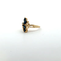 Yellow Gold Ring with Deep Blue Marquise Cut Sapphires